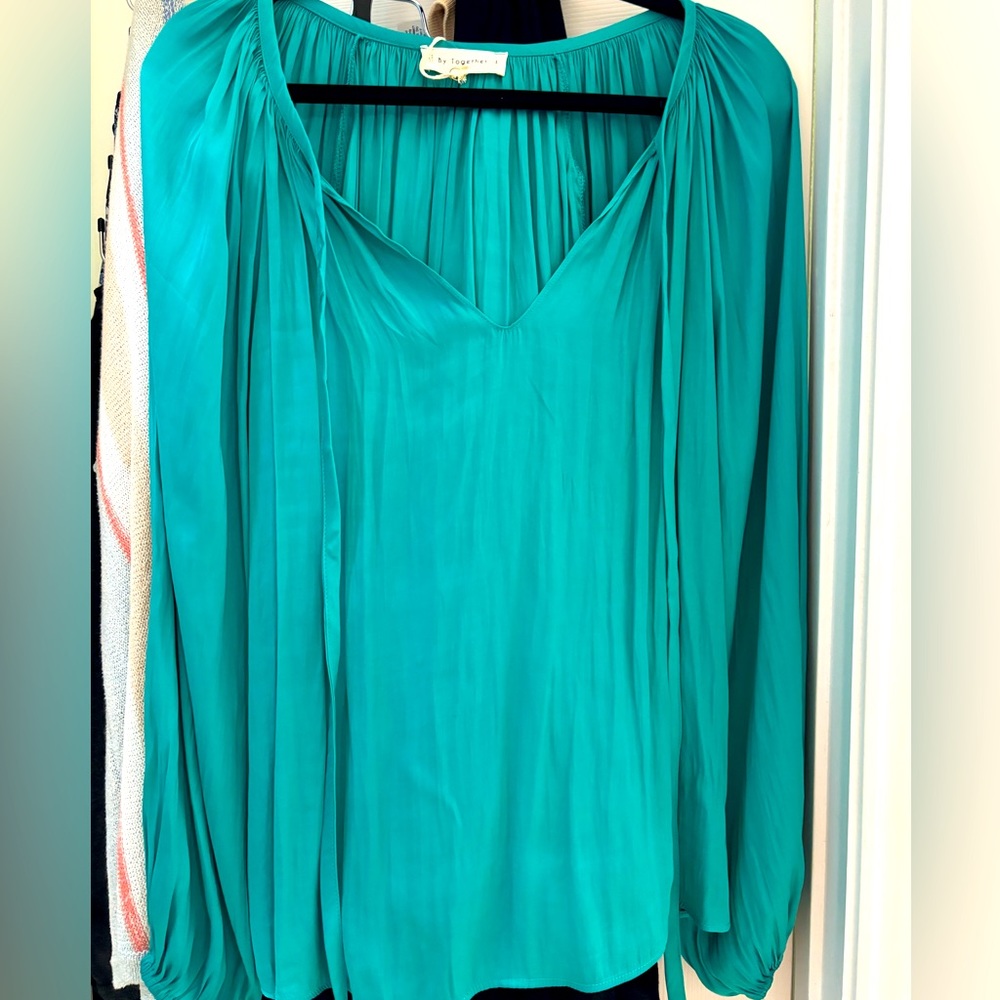 Beautiful polyester turquoise blouse
